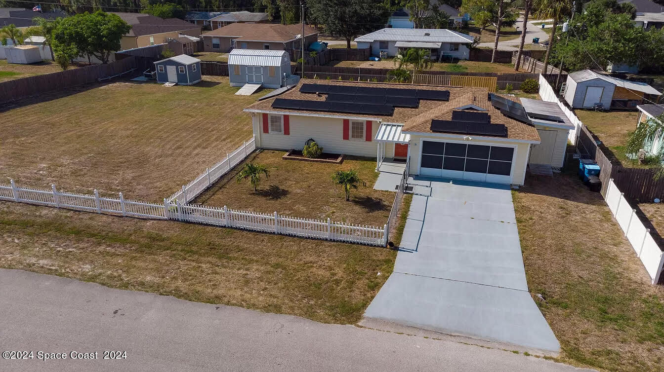 a view of a house with roof deck