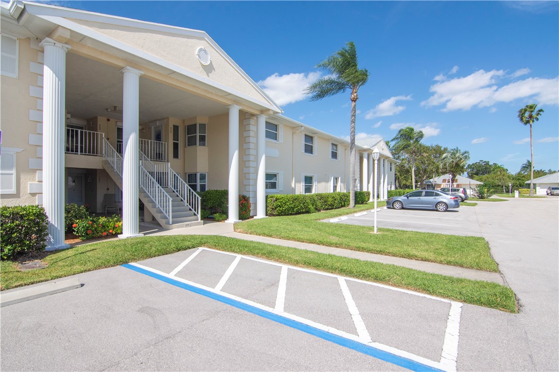 a view of a building with a yard