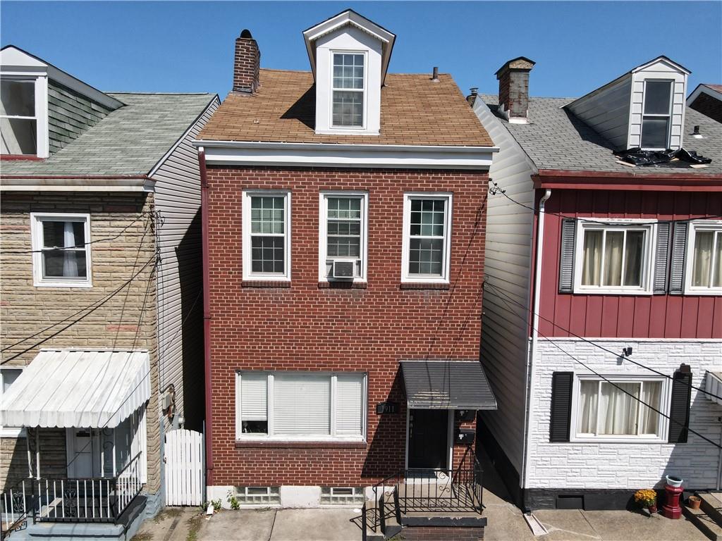 a front view of a house with a balcony