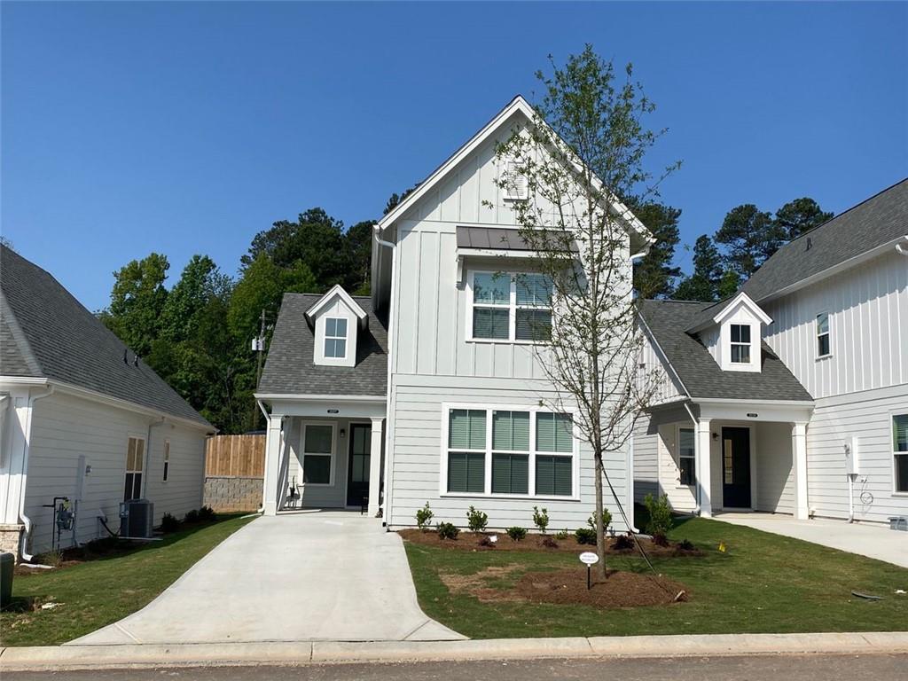 a front view of a house with a yard