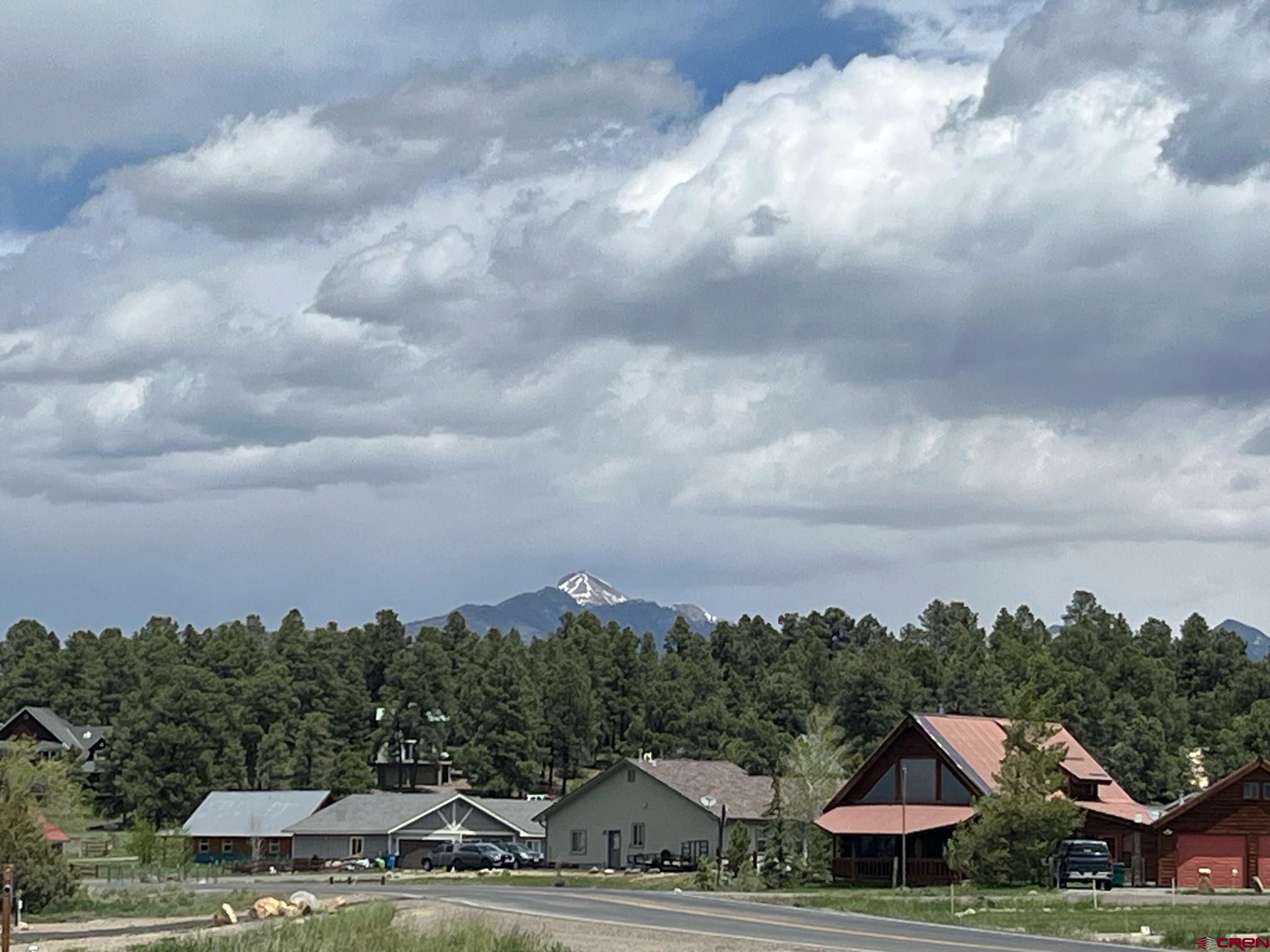 a view of houses with sky view