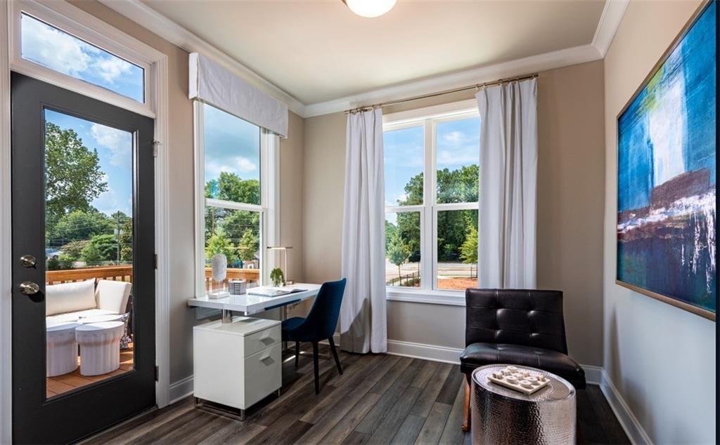 a view of a dining room with furniture window and outside view