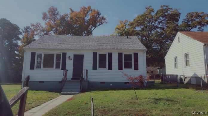 front view of house with a yard