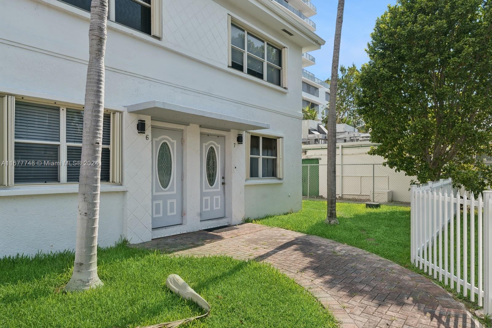 a view of a back yard of the house