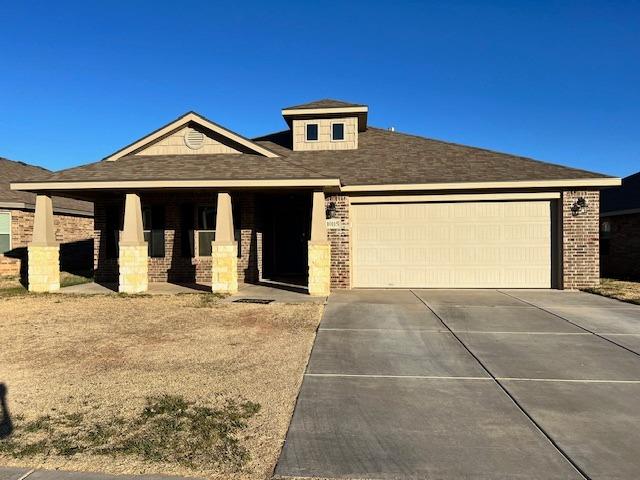 a front view of a house with yard