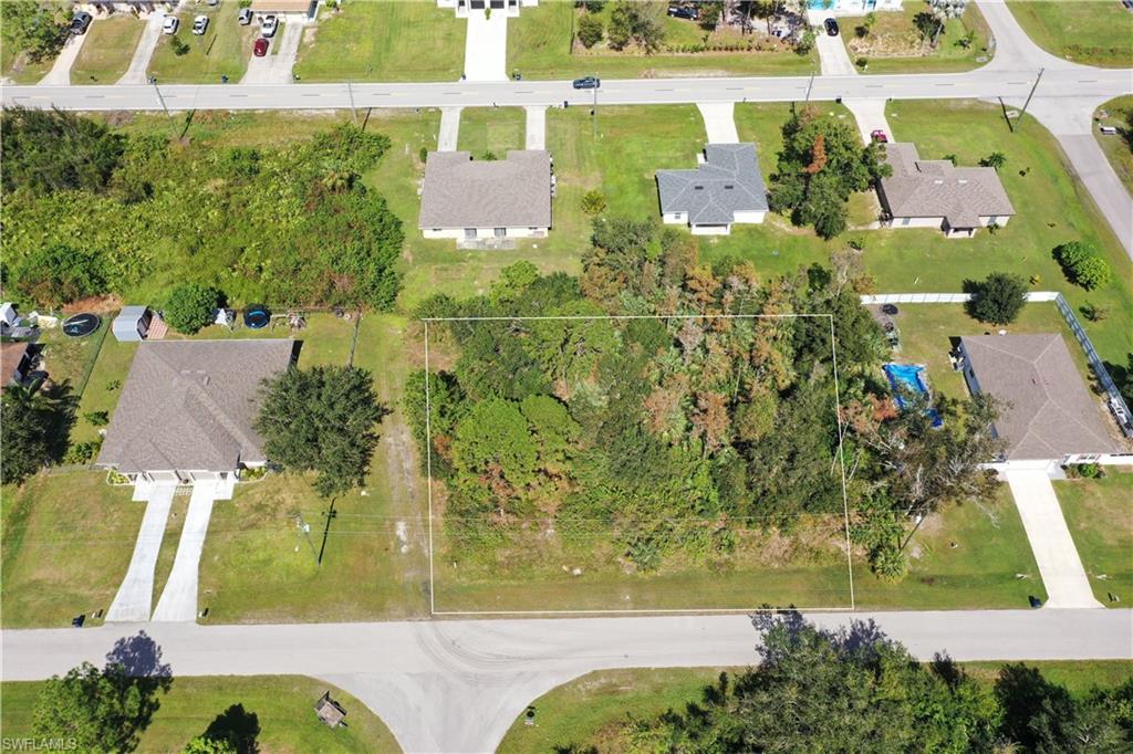 an aerial view of residential house with outdoor space