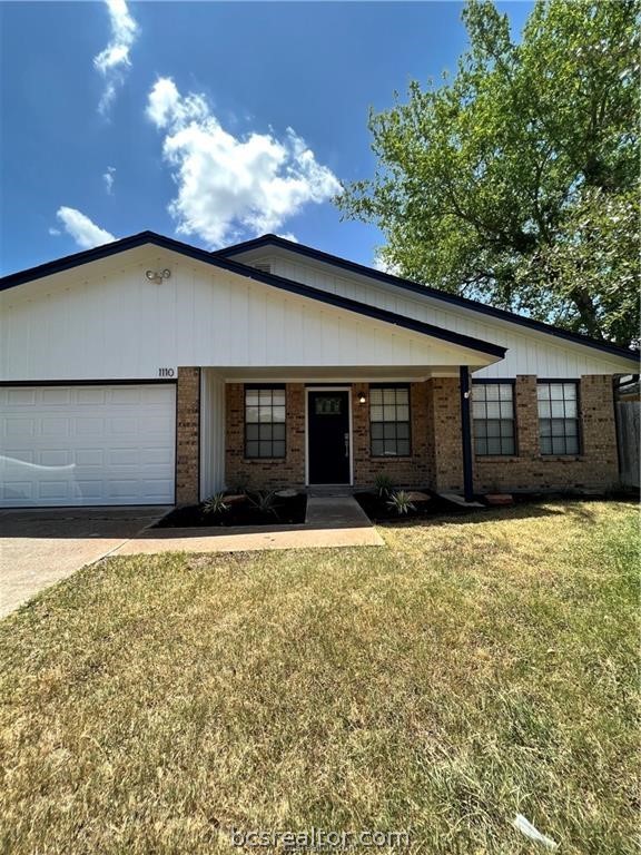 a front view of a house having yard