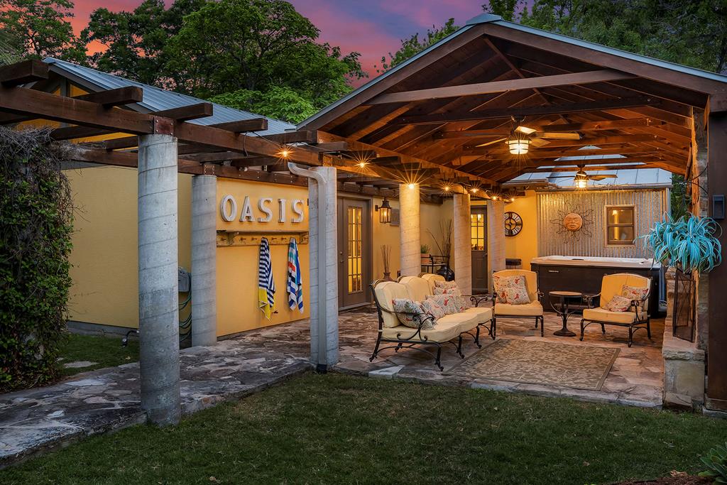 a patio with table and chairs