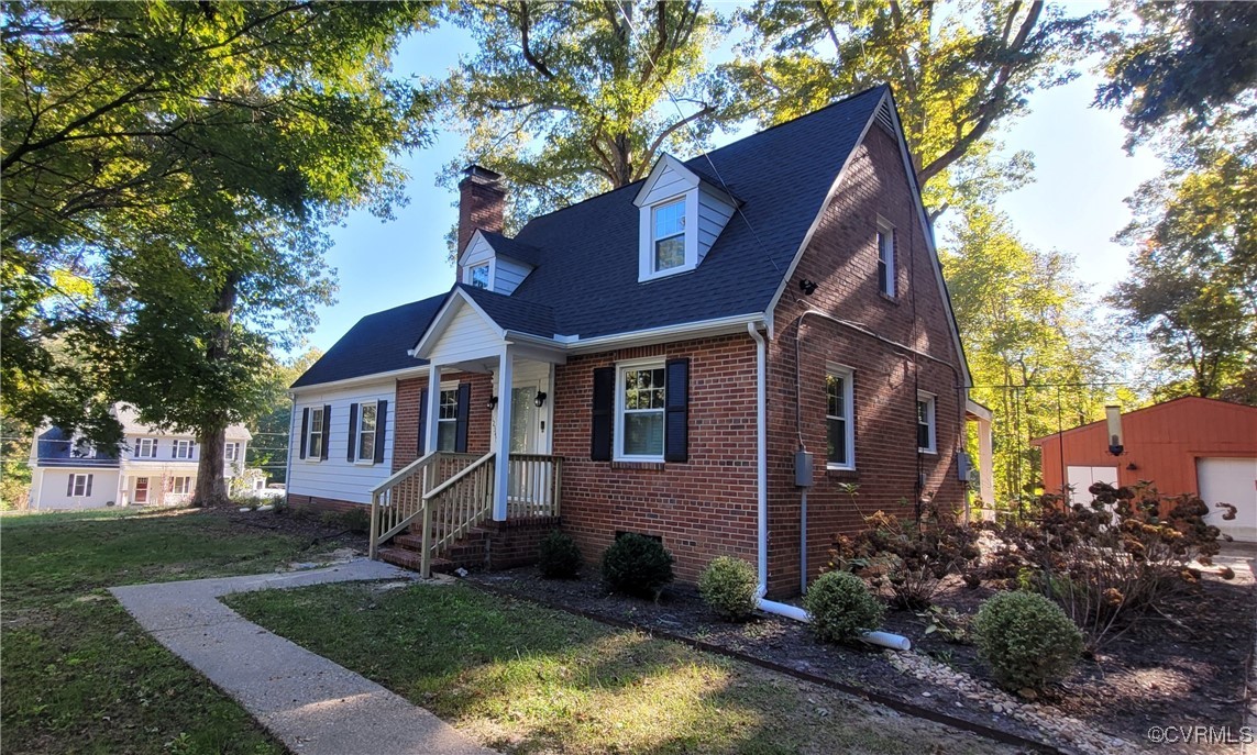 front view of a house with a yard