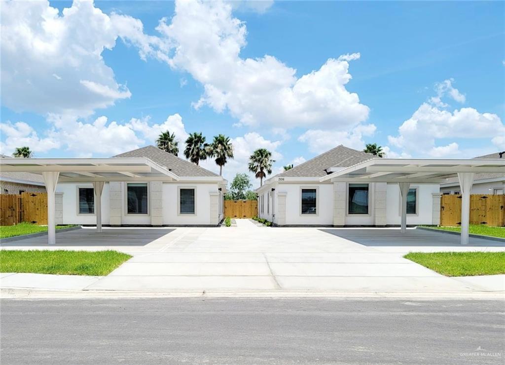 a house with a yard in front of it