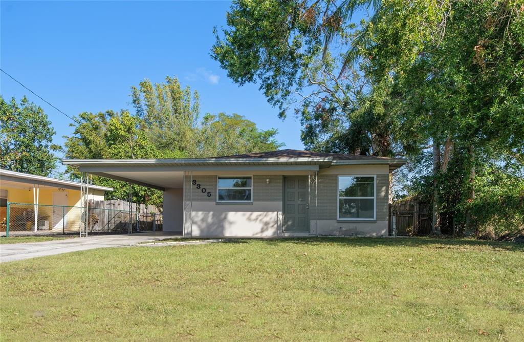 front view of a house with a big yard