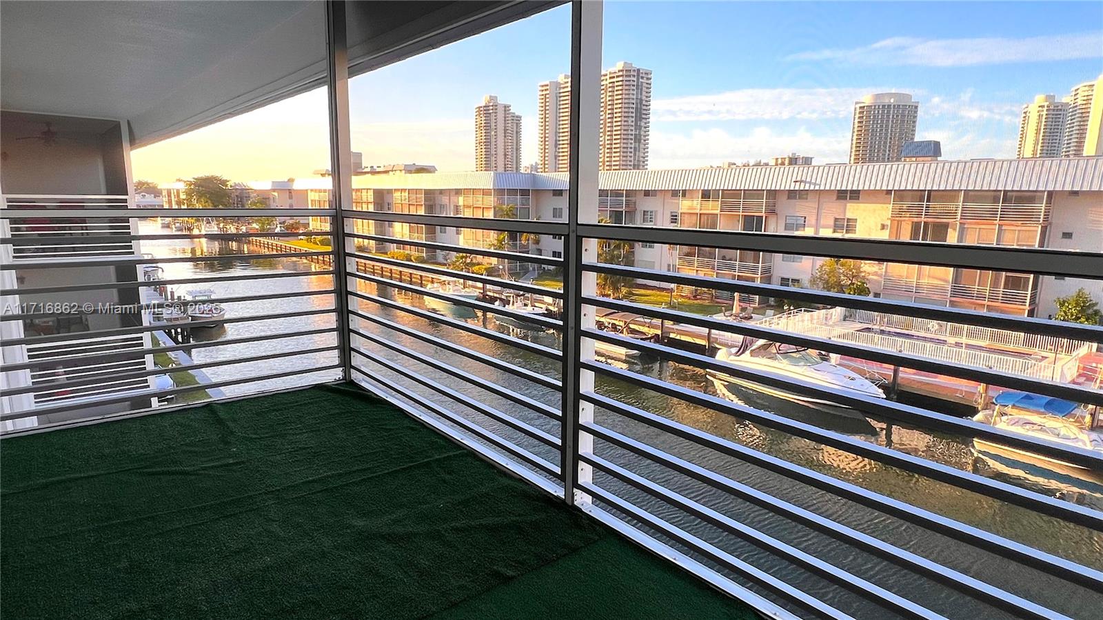 a view of a balcony with city view