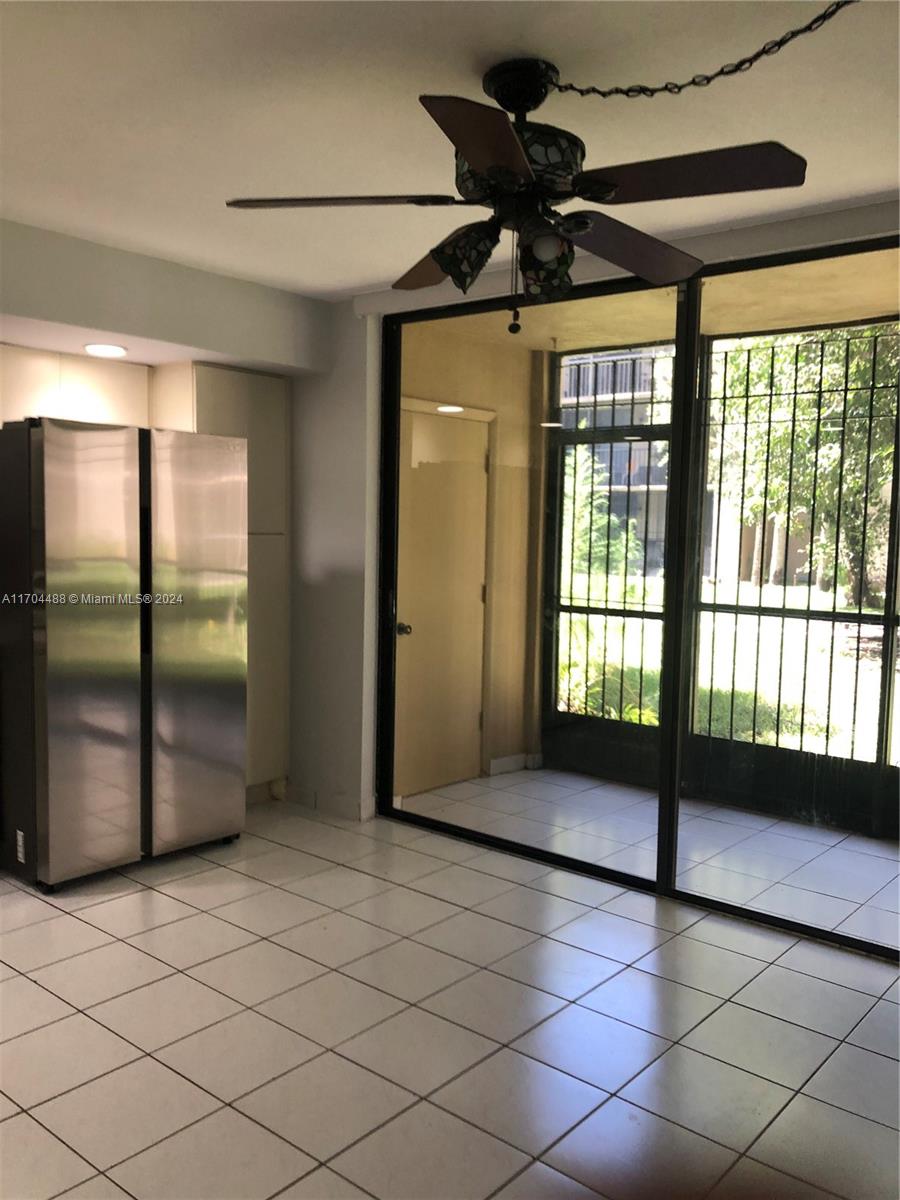 a view of an empty room and window