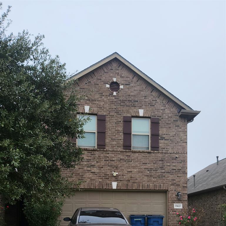 a front view of house with yard