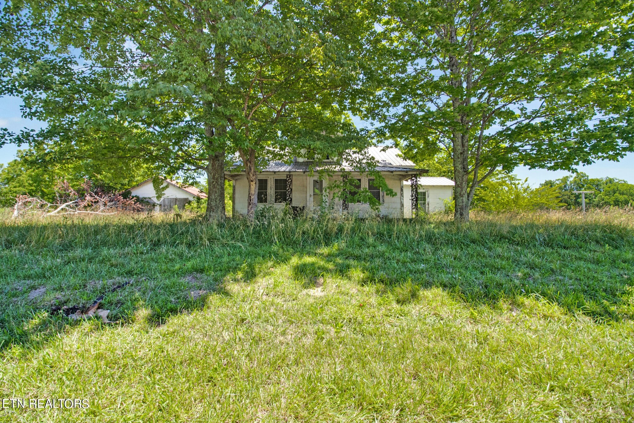 a house view with a garden space