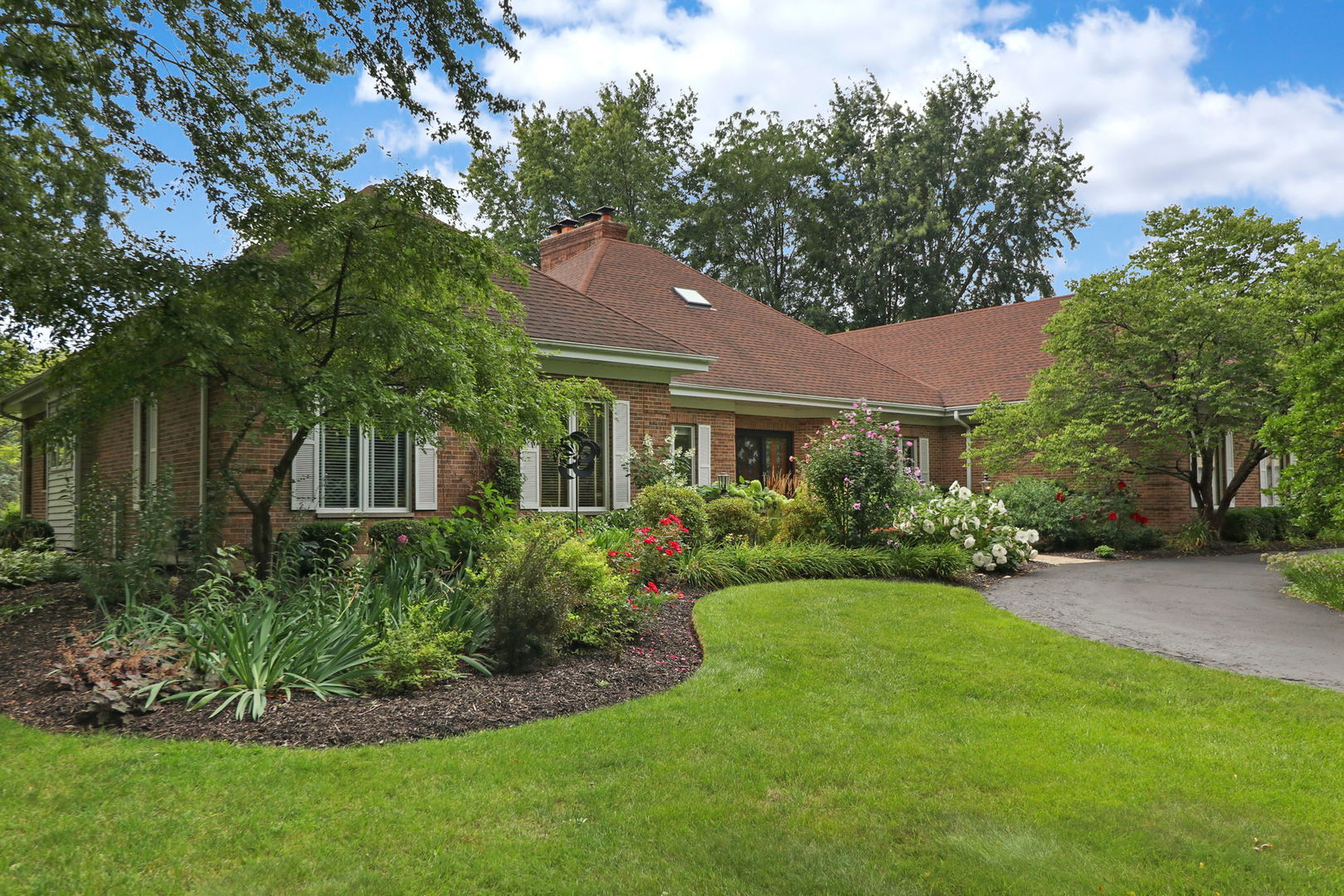 a view of a house with a garden