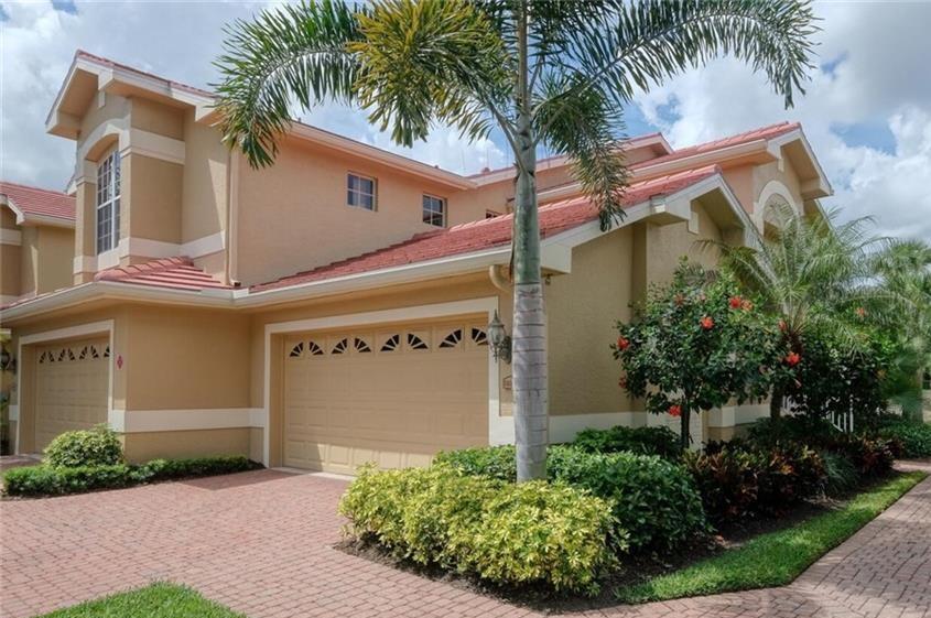 front view of a house with a garden