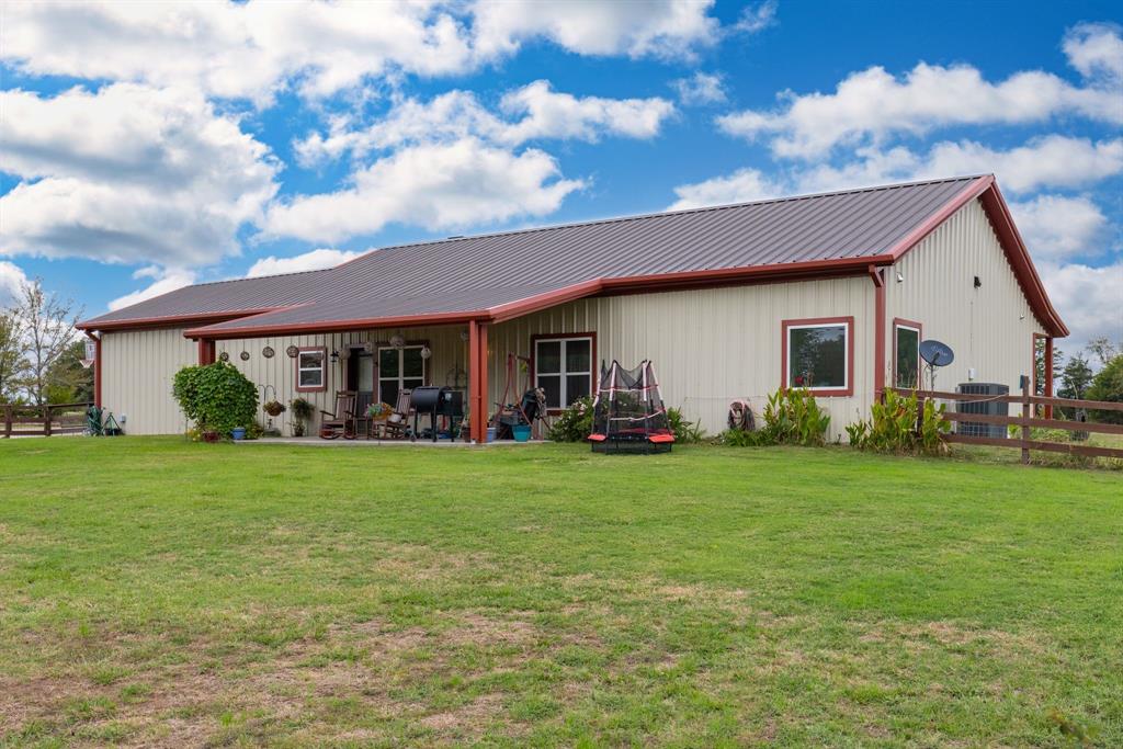 front view of a house with a garden