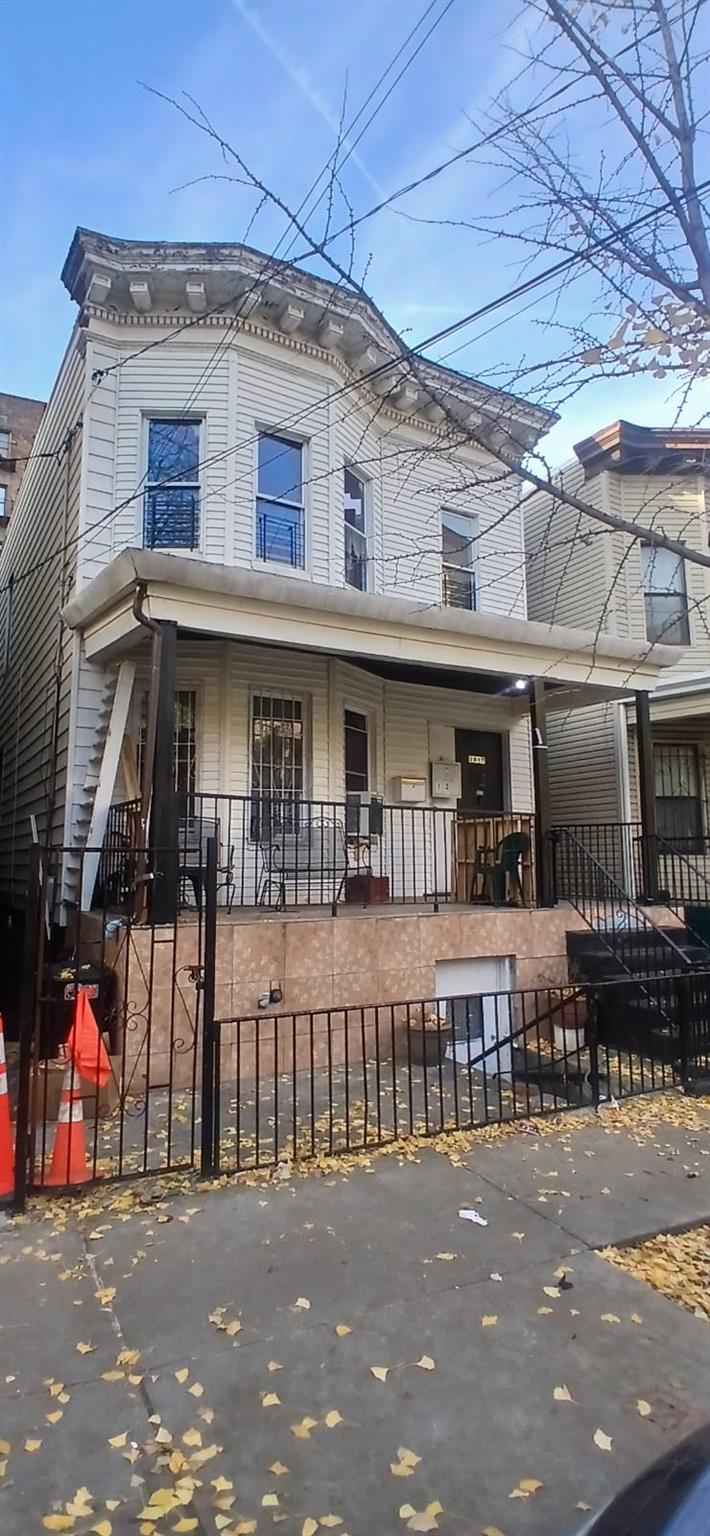 View of front facade featuring a porch