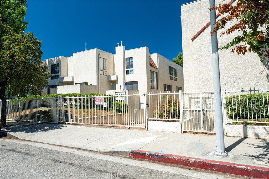 a view of a building with a street