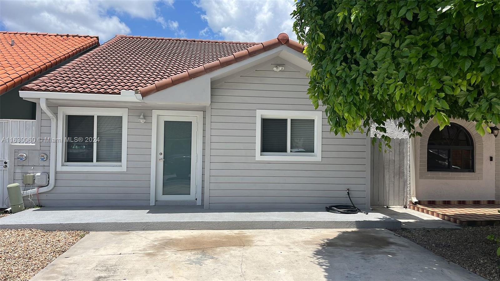 a view of a house with a patio