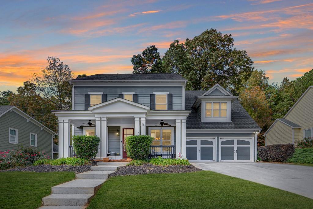 front view of a house with a yard