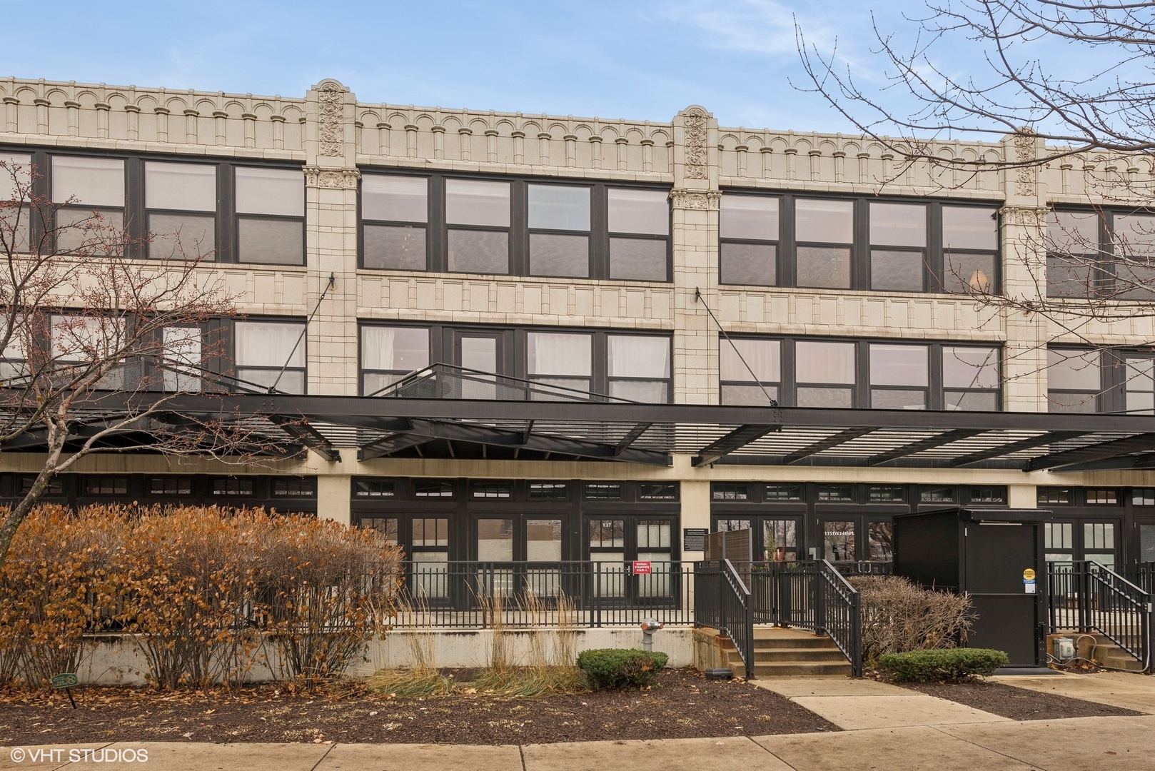 a front view of a building with glass windows