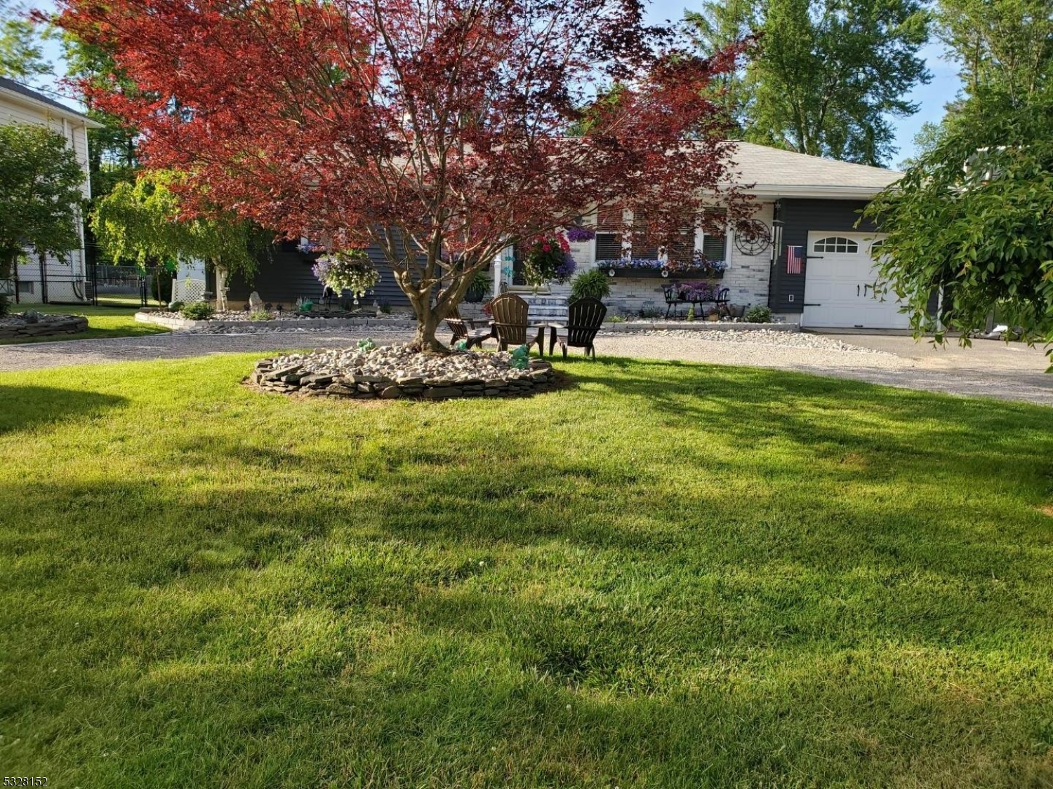 a swimming pool with outdoor seating and yard