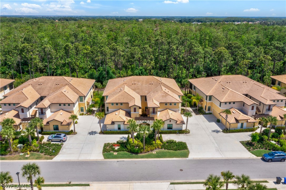 an aerial view of a house with a garden