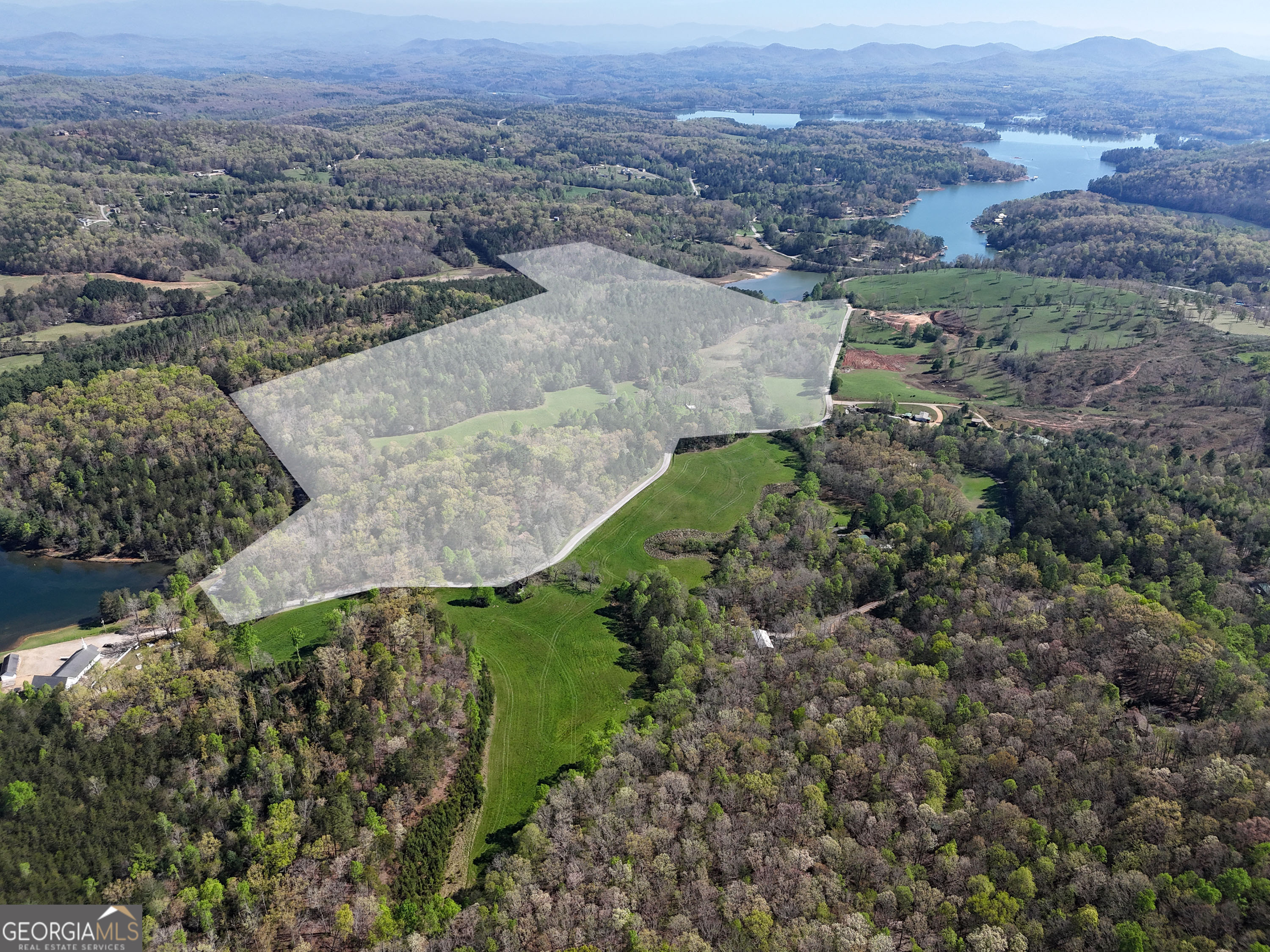 an aerial view of residential house with outdoor space