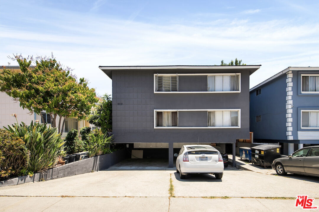 a car parked in front of a house