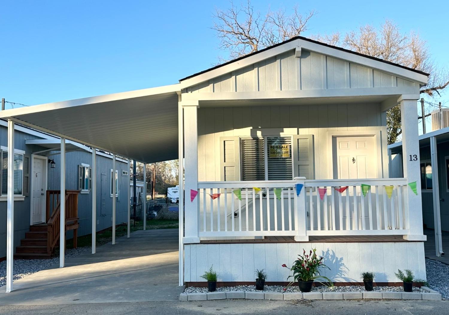 a front view of a house with a porch