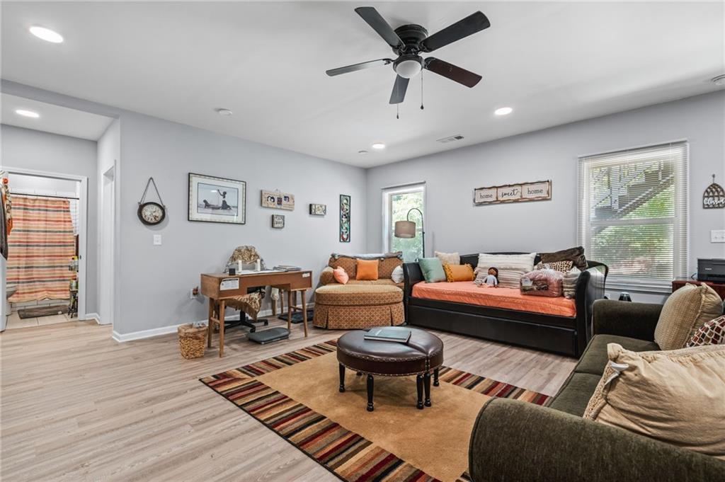 a living room with furniture and a window