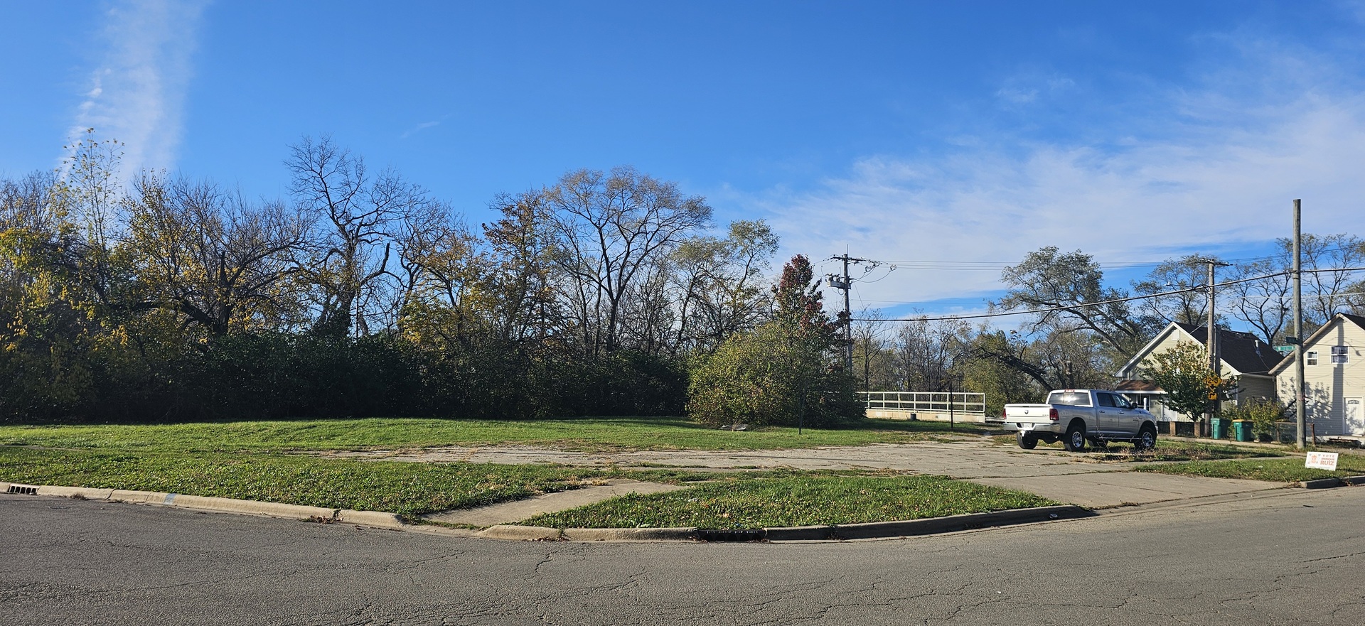 a view of a playground with basketball court