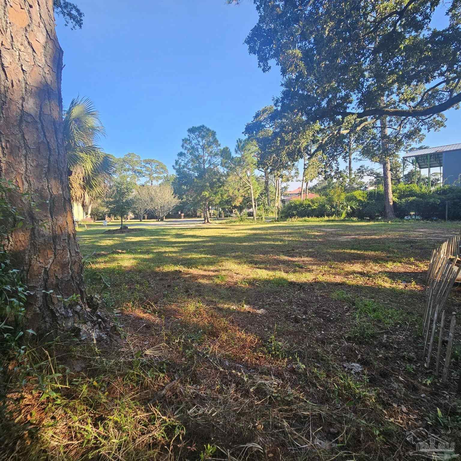 a view of an lake with a big yard