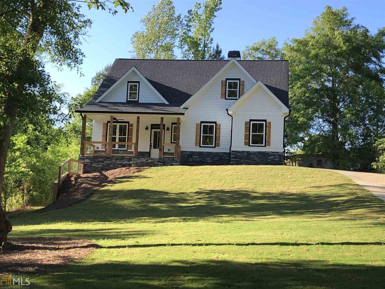 Exterior Front.  Photos are not of the actual home because it is to be built.  These are actual photos of the same floor plan recently built in 2 other Forsyth County locations.