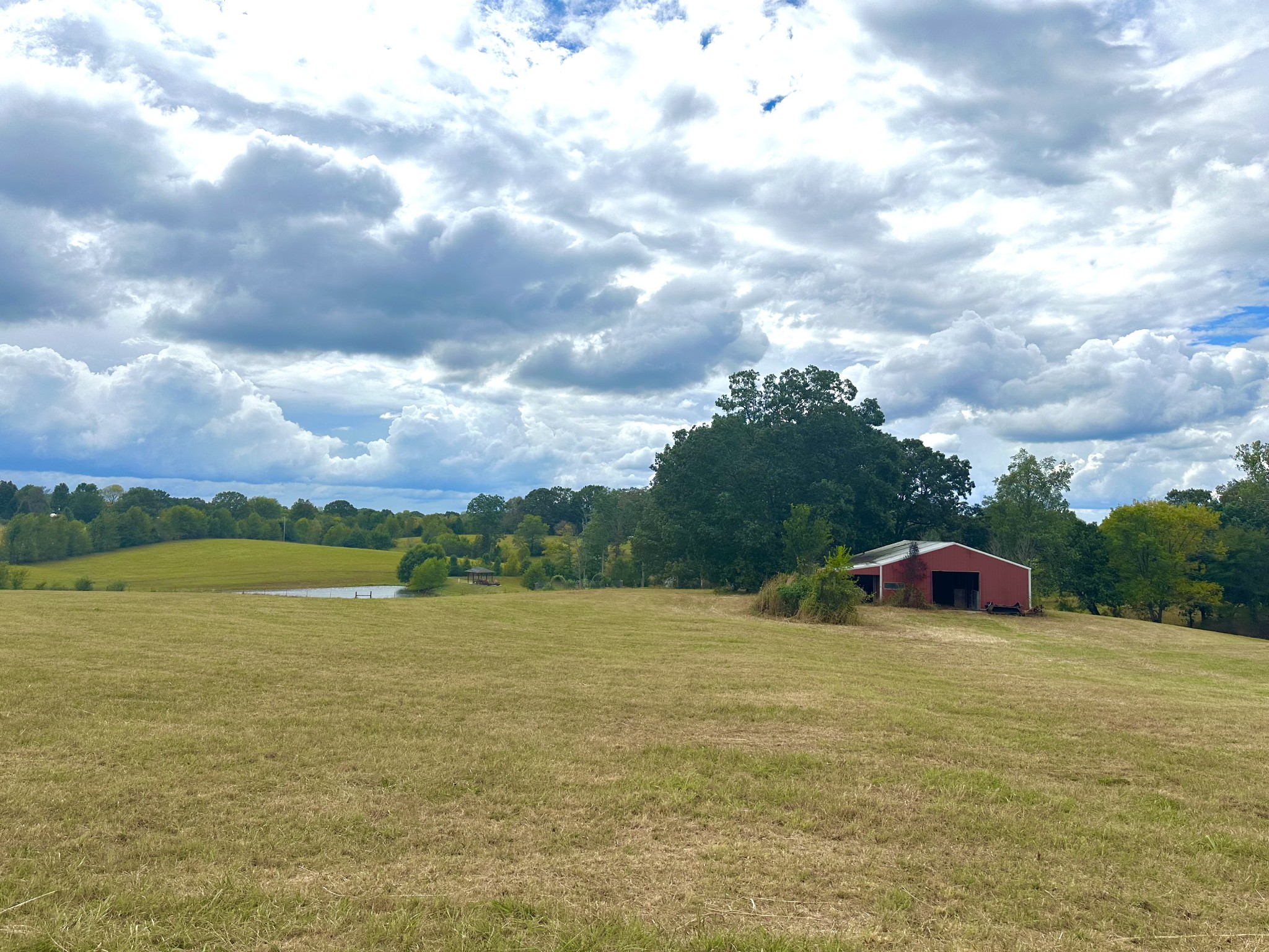 a view of a lake with a yard