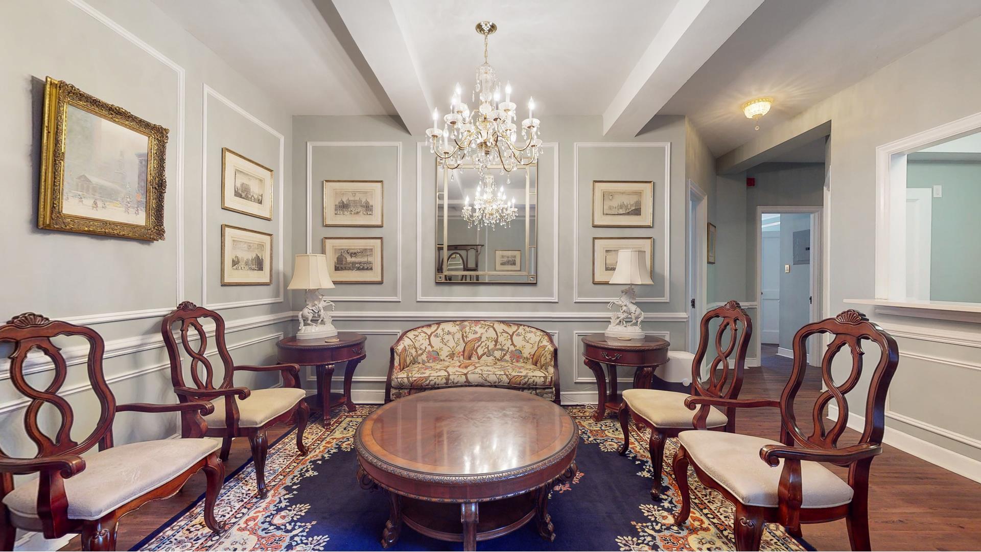 a dining room with furniture and window