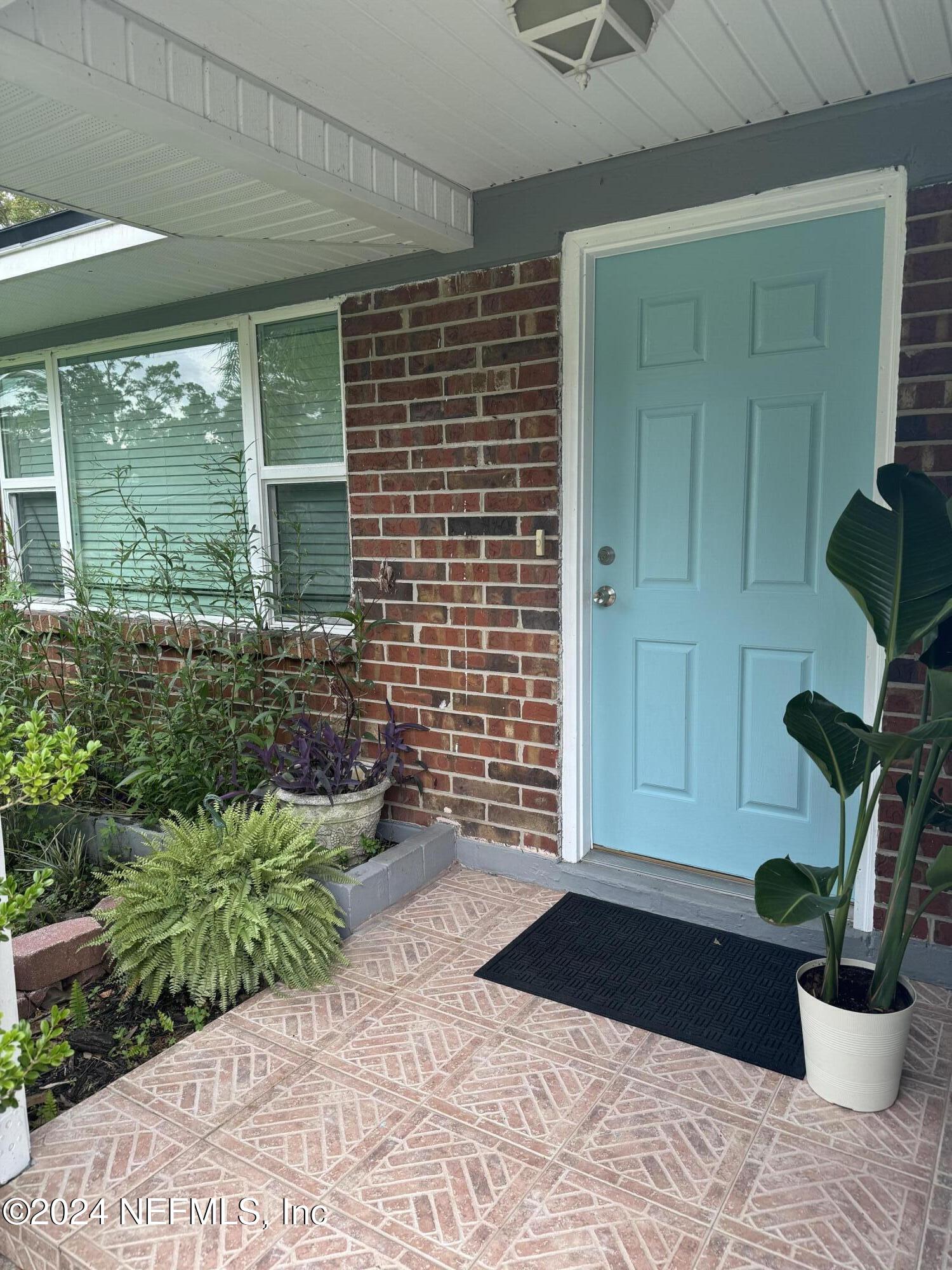 a view of a entryway door front of house