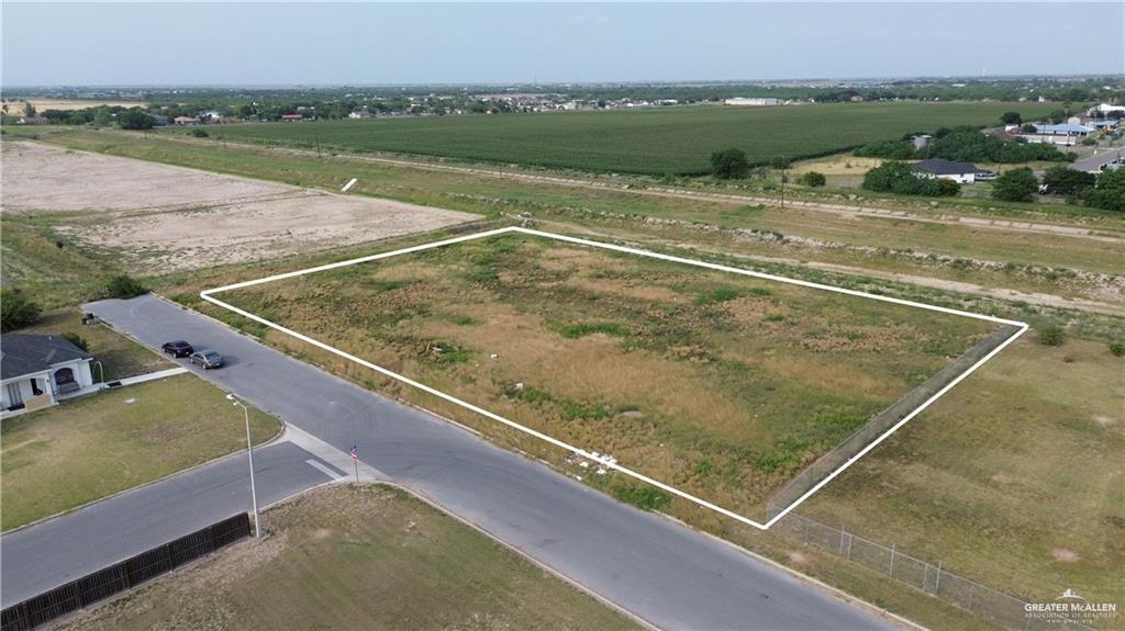 Birds eye view of property featuring a rural view