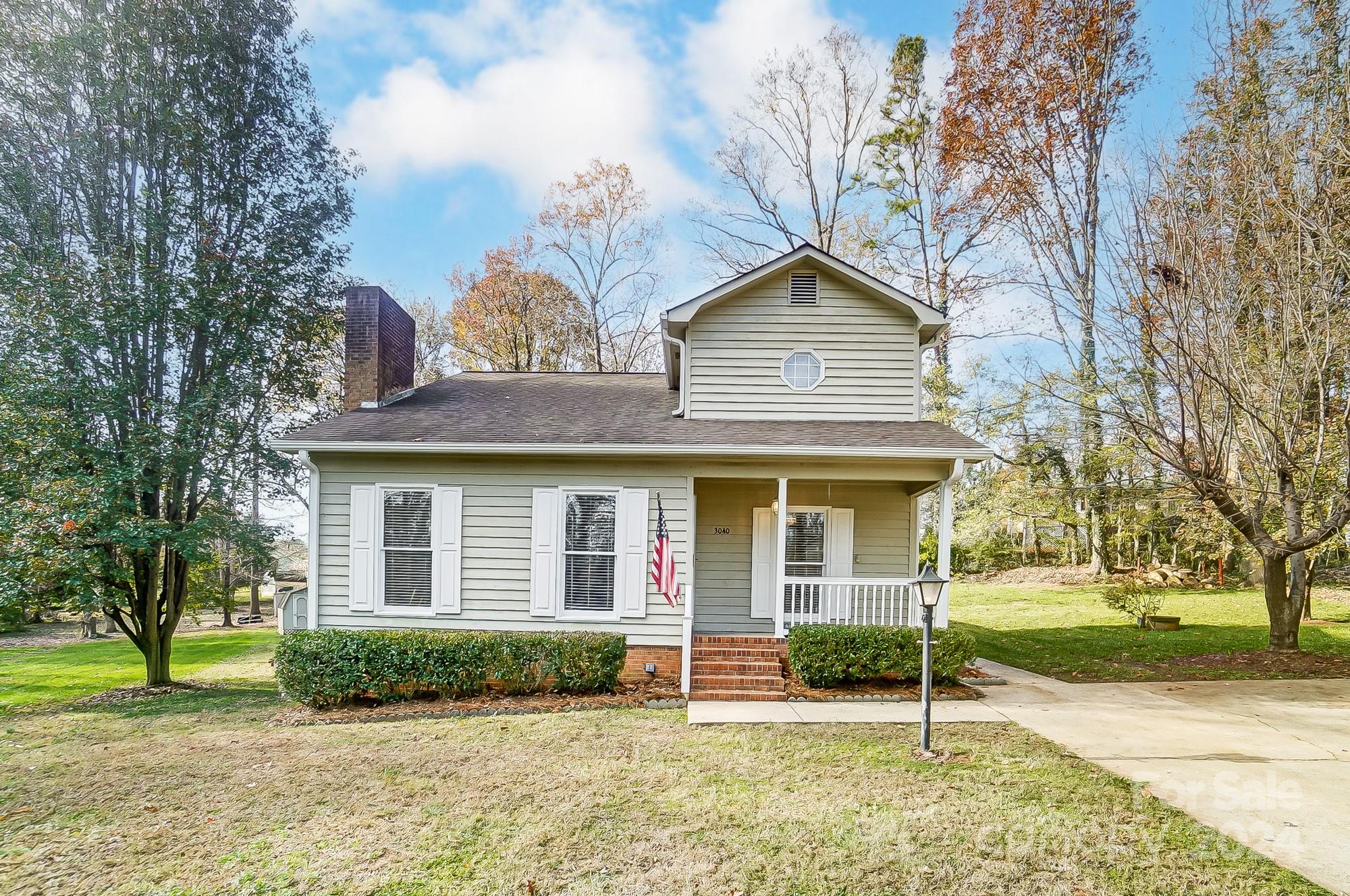 front view of a house with a yard