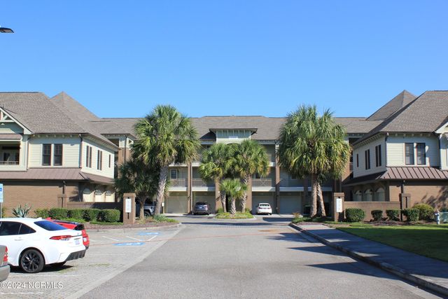 $460,000 | 550 Grande Manor Court, Unit 205 | Village at Mayfaire