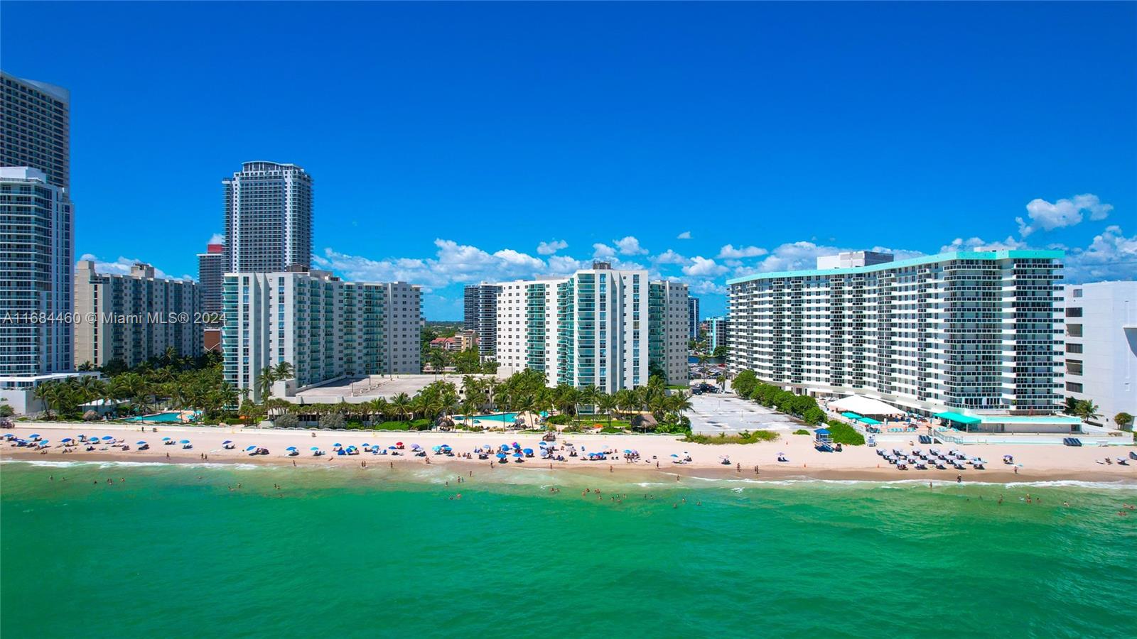 a view of a city with tall buildings