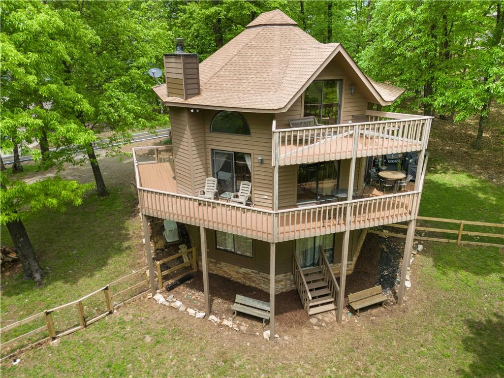 an aerial view of a house with a balcony