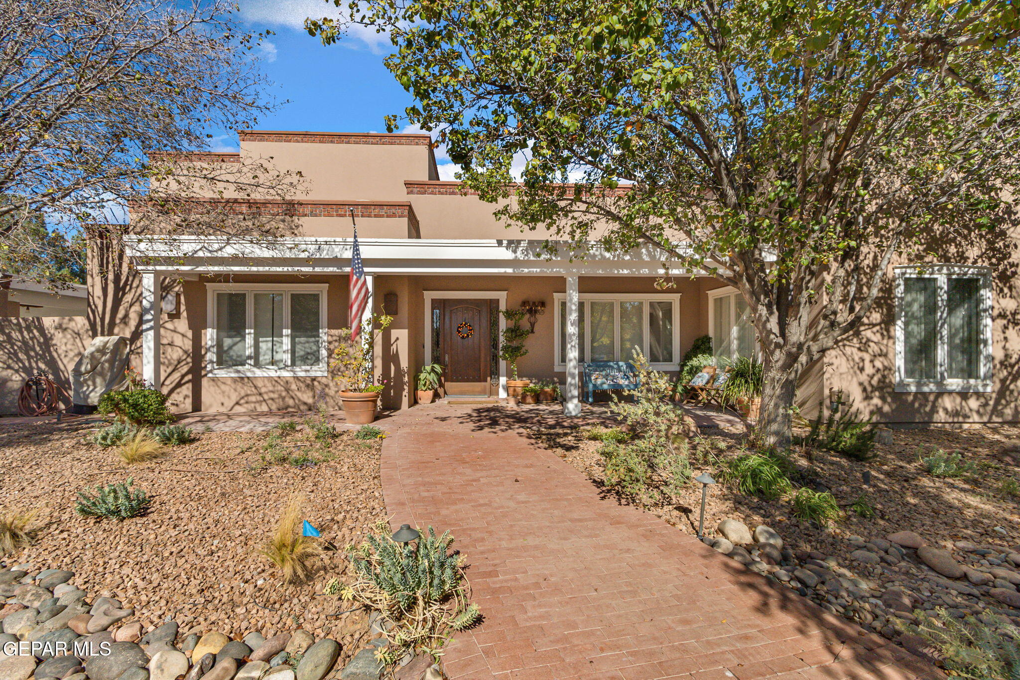 front view of a house with a patio