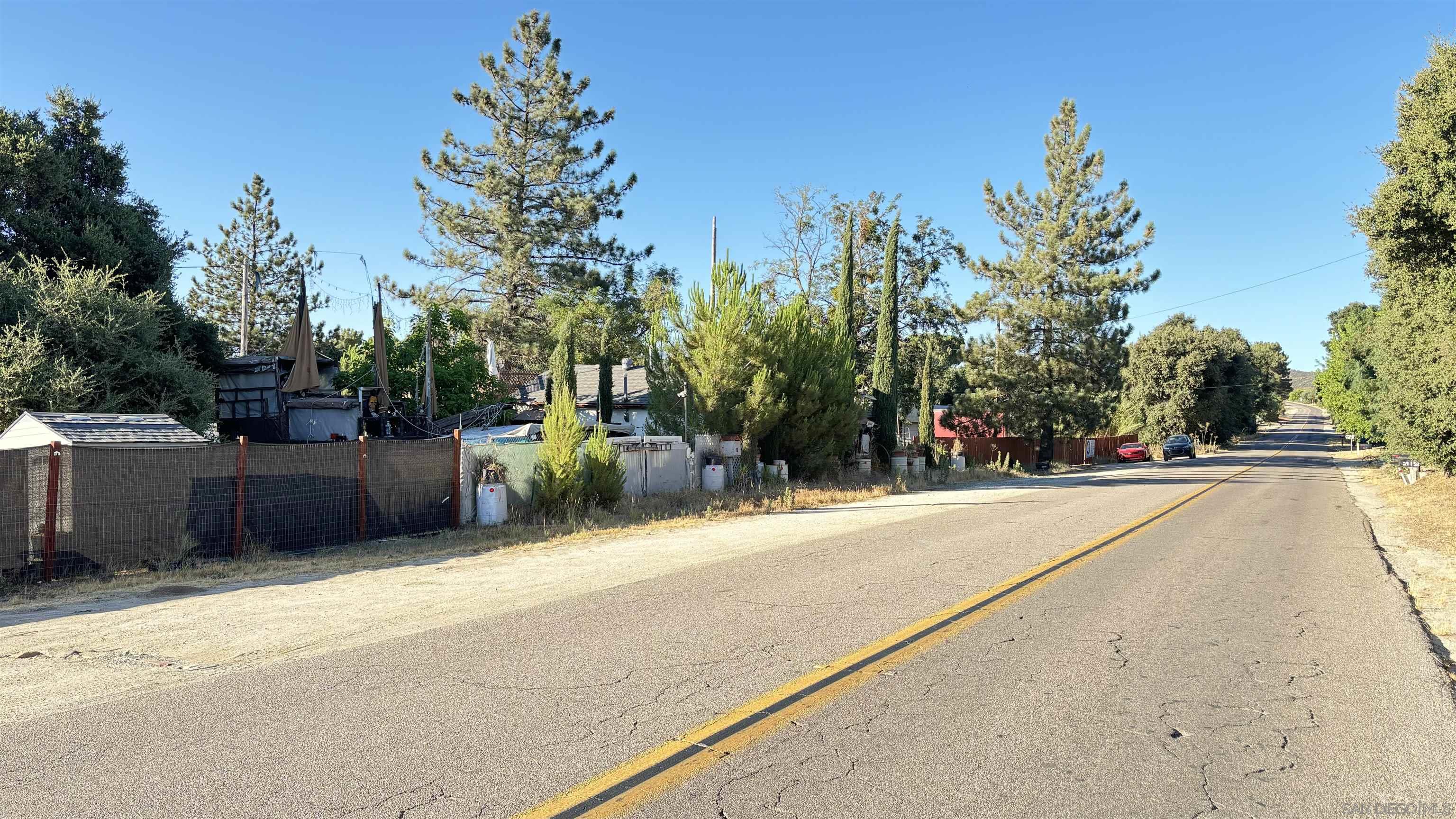 a view of a street with houses