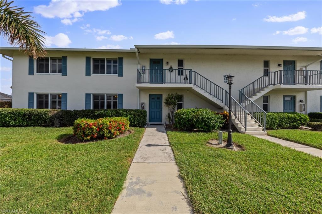 View of front of house with a front lawn