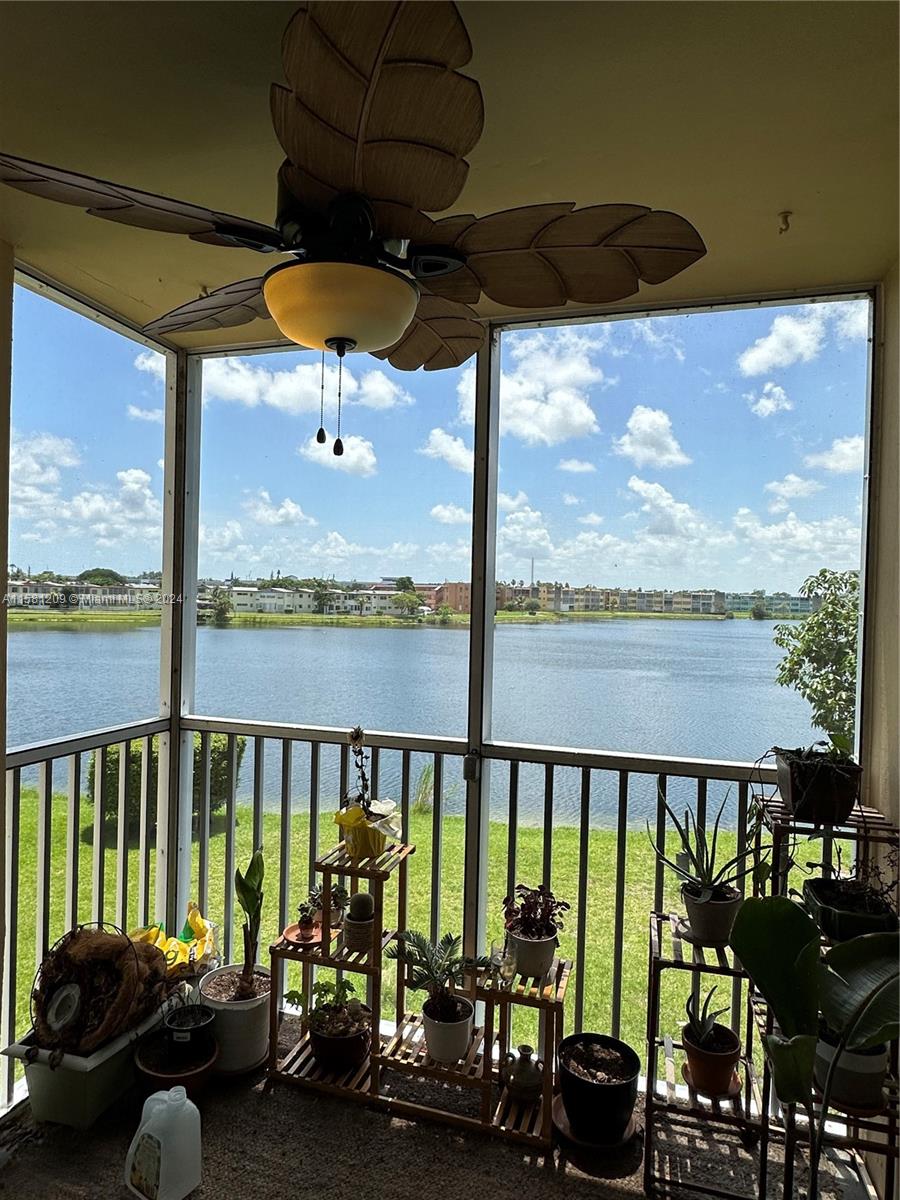 a view of a balcony with chairs