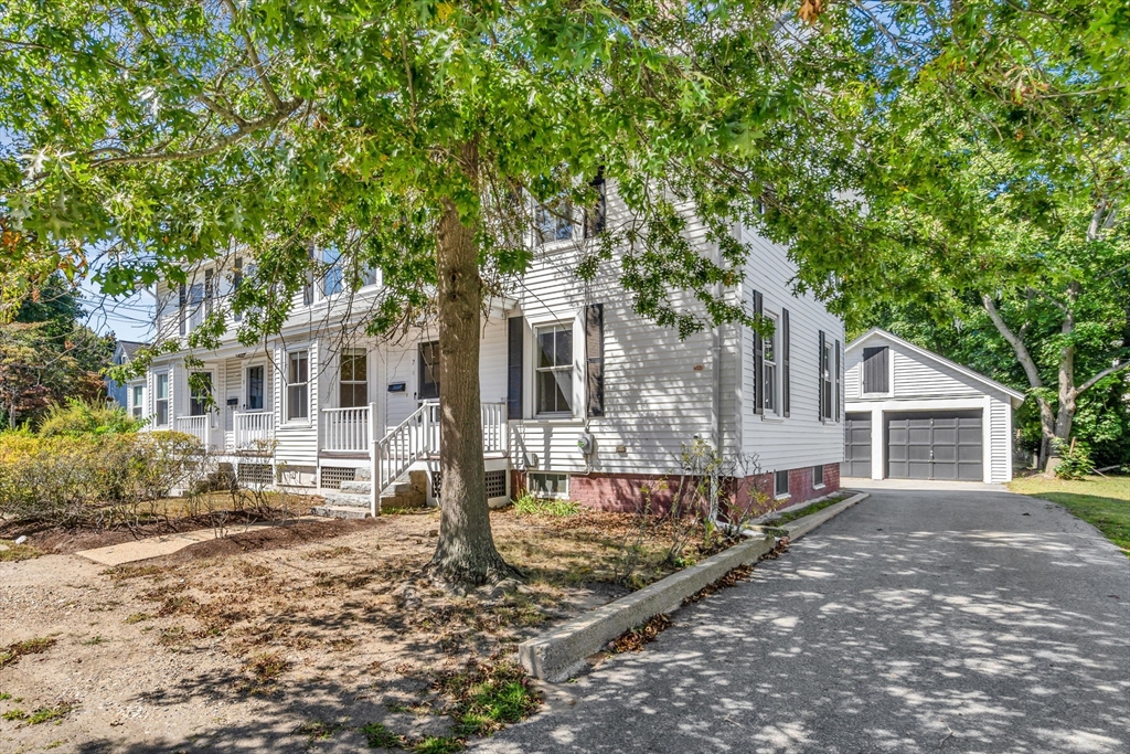 a front view of a house with yard