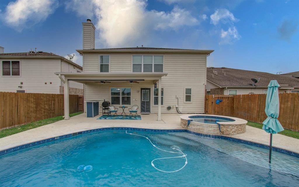 a front view of a house with patio